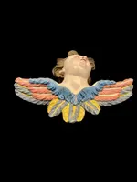 Carved and painted wooden cherub. Liguria.