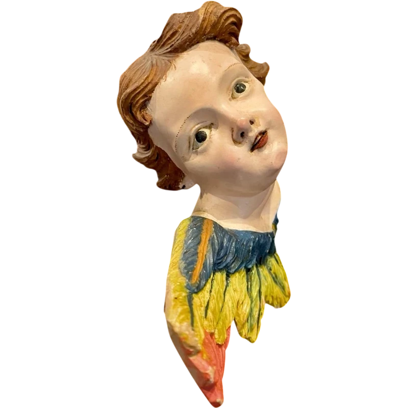 Carved and painted wooden cherub. Liguria.