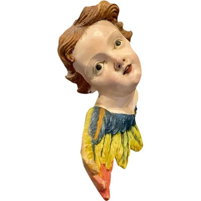 Carved and painted wooden cherub. Liguria.