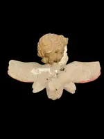 Carved and painted wooden cherub. Liguria.