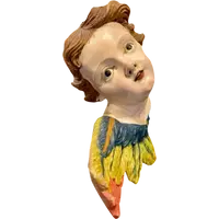 Carved and painted wooden cherub. Liguria.