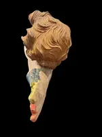 Carved and painted wooden cherub. Liguria.