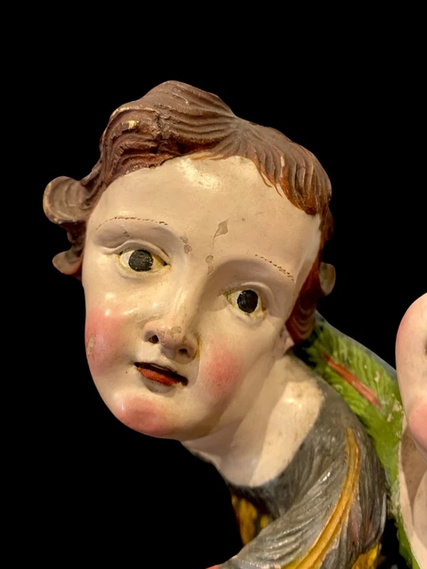 Coppia di Angeli-cherubini in legno intagliato e dipinto. Liguria.