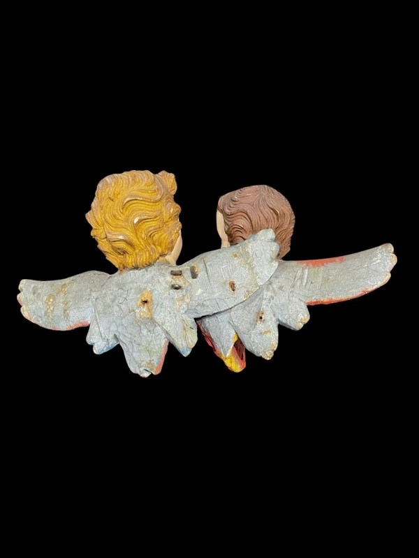 Coppia di Angeli-cherubini in legno intagliato e dipinto. Liguria.