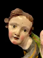 Coppia di Angeli-cherubini in legno intagliato e dipinto. Liguria.