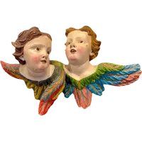 Coppia di Angeli-cherubini in legno intagliato e dipinto. Liguria.