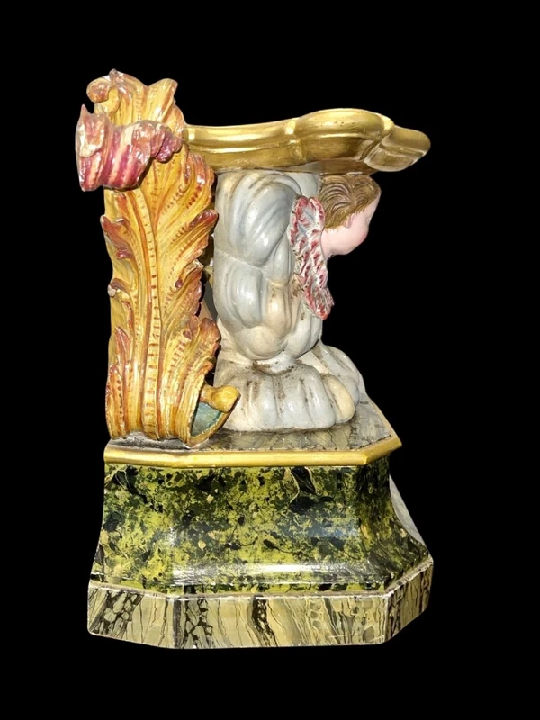 Carved and painted wooden statue base.