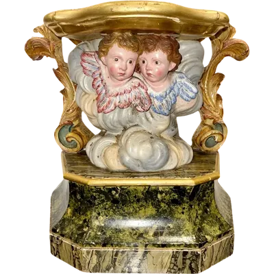 Carved and painted wooden statue base.