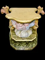 Carved and painted wooden statue base.