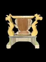 Carved and painted wooden statue base.