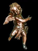 Paire d'anges en bois sculpté, non peints, à accrocher au mur. Ligurie.