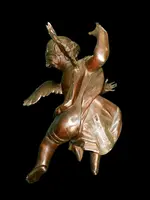 Paire d'anges en bois sculpté, non peints, à accrocher au mur. Ligurie.