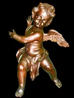 Paire d'anges en bois sculpté, non peints, à accrocher au mur. Ligurie.