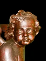 Paire d'anges en bois sculpté, non peints, à accrocher au mur. Ligurie.