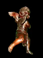 Paire d'anges en bois sculpté, non peints, à accrocher au mur. Ligurie.
