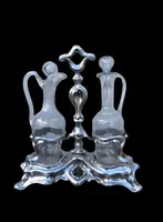 Silver oil cruet with embossed Art Nouveau motifs. Minerva hallmark. France.