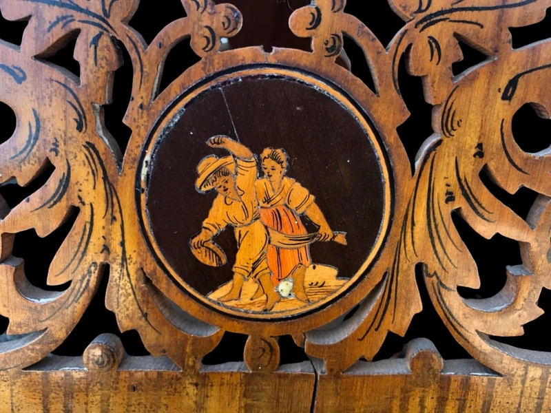 Travel mirror with two folding doors made of carved and inlaid wood