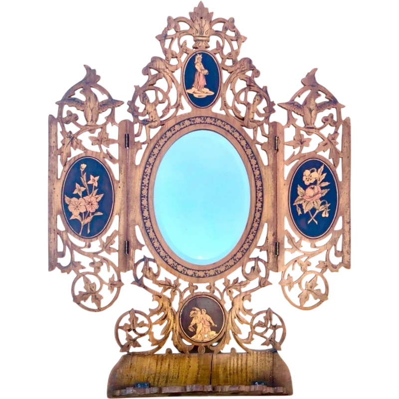 Travel mirror with two folding doors made of carved and inlaid wood