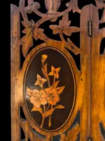 Travel mirror with two folding doors made of carved and inlaid wood