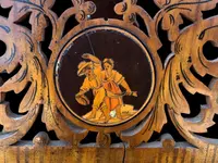 Travel mirror with two folding doors made of carved and inlaid wood