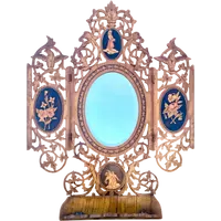 Travel mirror with two folding doors made of carved and inlaid wood