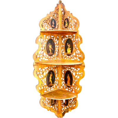 Etagere corner wall sconce made of openwork wood with three shelves and medallions depicting folk scenes.
