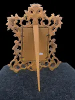 Rectangular box frame made of carved, openwork wood with gold leaf. Florence.