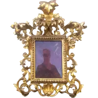 Rectangular box frame made of carved, openwork wood with gold leaf. Florence.