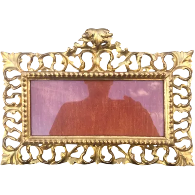 Rectangular box frame made of carved, openwork wood with gold leaf. Florence.