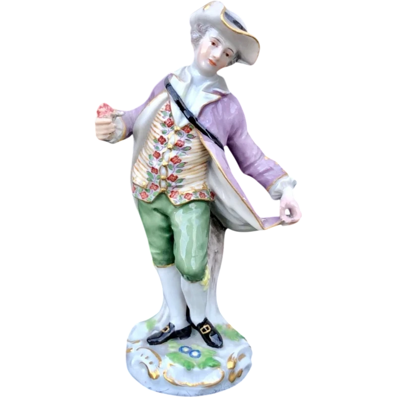 Statuina in porcellana raffigurante personaggio maschile con gelato.Meissen.Germania.