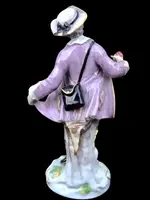 Statuina in porcellana raffigurante personaggio maschile con gelato.Meissen.Germania.