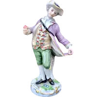 Statuina in porcellana raffigurante personaggio maschile con gelato.Meissen.Germania.