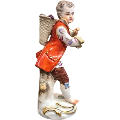 Statuina in porcellana con figura maschile con cesto.Meissen.