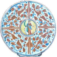 A majolica dish featuring calligraphic and naturalistic decorations, with a figure of a saint in the center