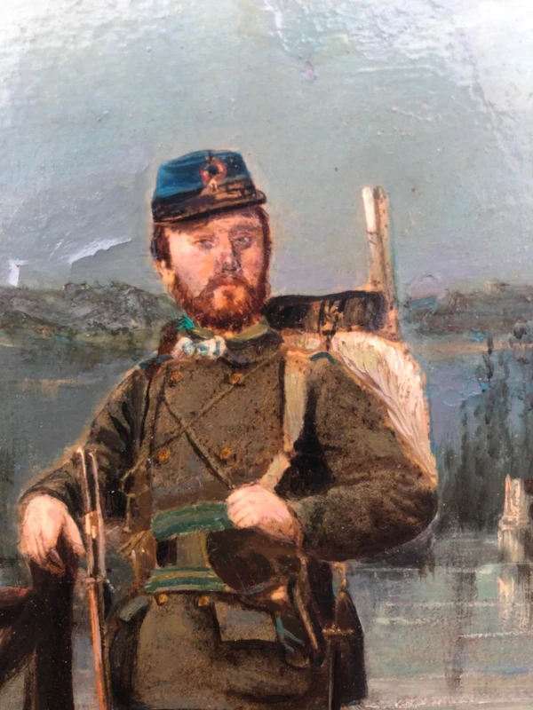 Oil painting on cardboard depicting a soldier against a rural backdrop. Signed: Eraud.