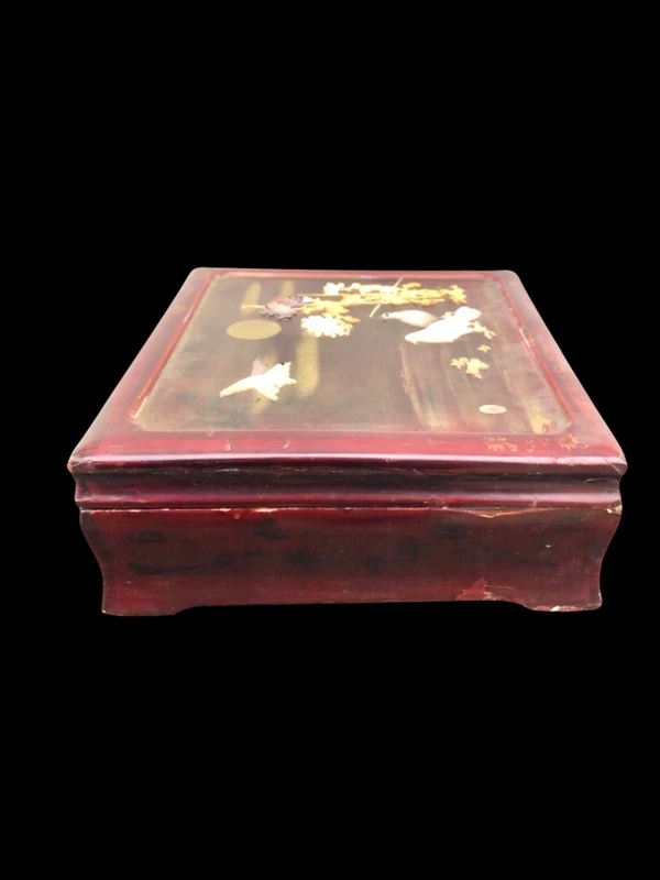 Mahogany box with inlays of various materials and mother-of-pearl
