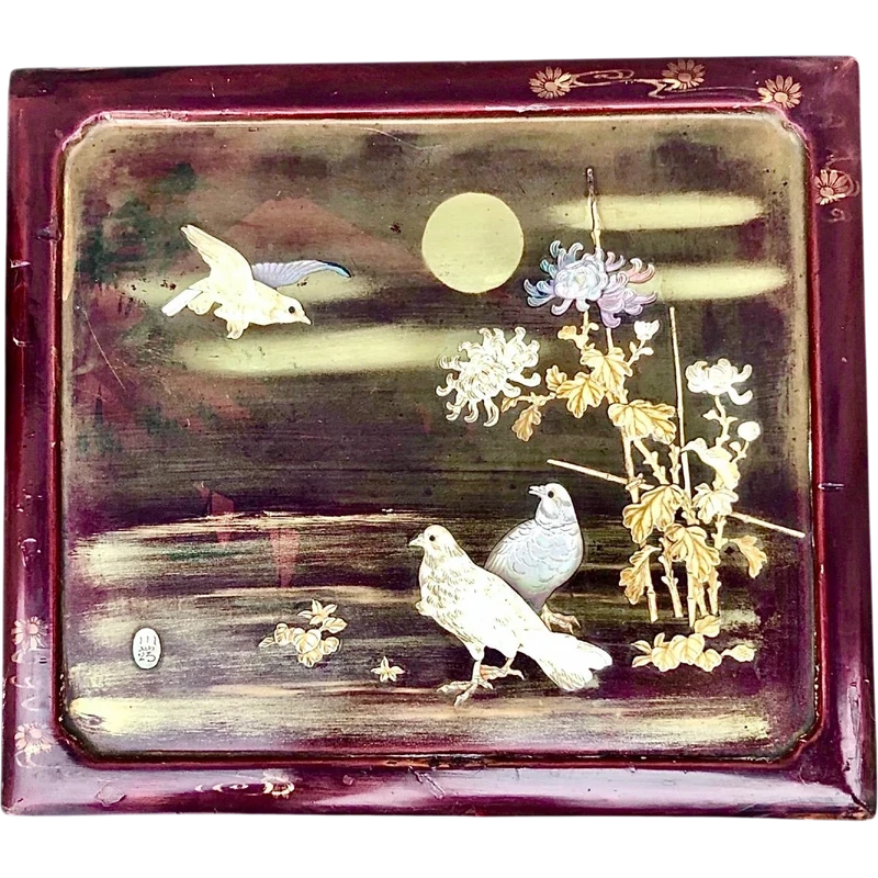Mahogany box with inlays of various materials and mother-of-pearl