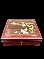 Mahogany box with inlays of various materials and mother-of-pearl