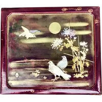 Mahogany box with inlays of various materials and mother-of-pearl