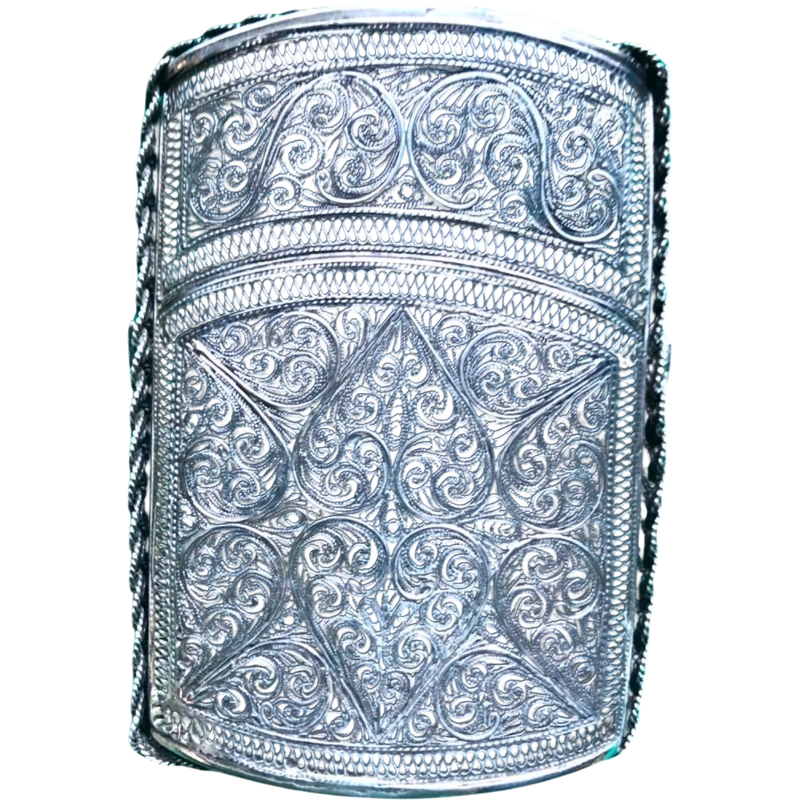 Silver filigree card holder featuring plant motifs and stylized scrolls.