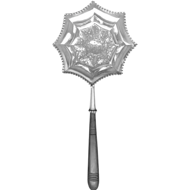 Silver tea strainer with an embossed eight-pointed geometric pattern. Ebony handle. Tiffany