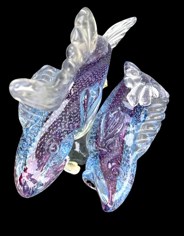 Pair of fish in heavy, bubbling amethyst-colored glass. Flavio Poli