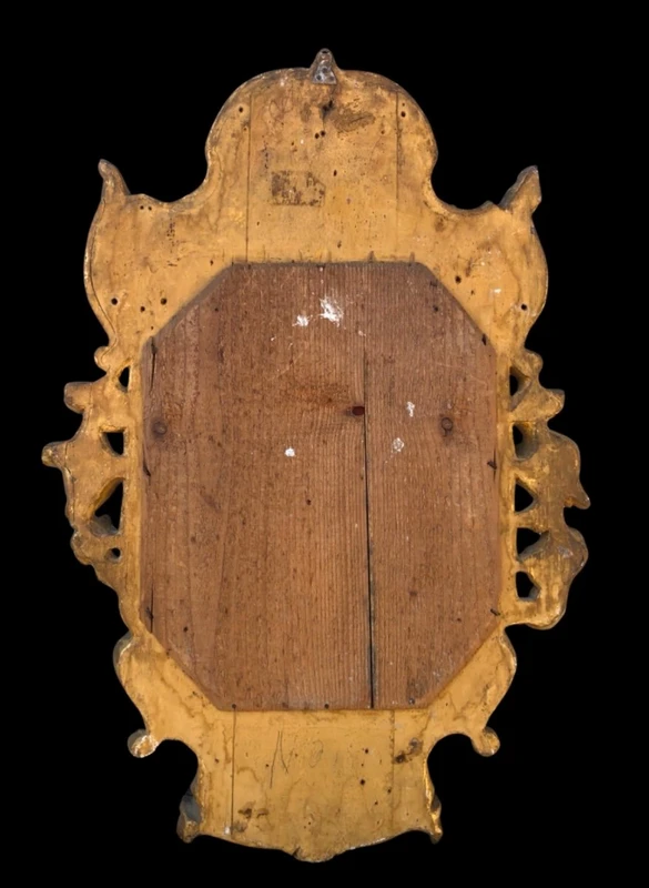 Frame - a carved and gilded wooden mirror featuring floral and rocaille motifs.