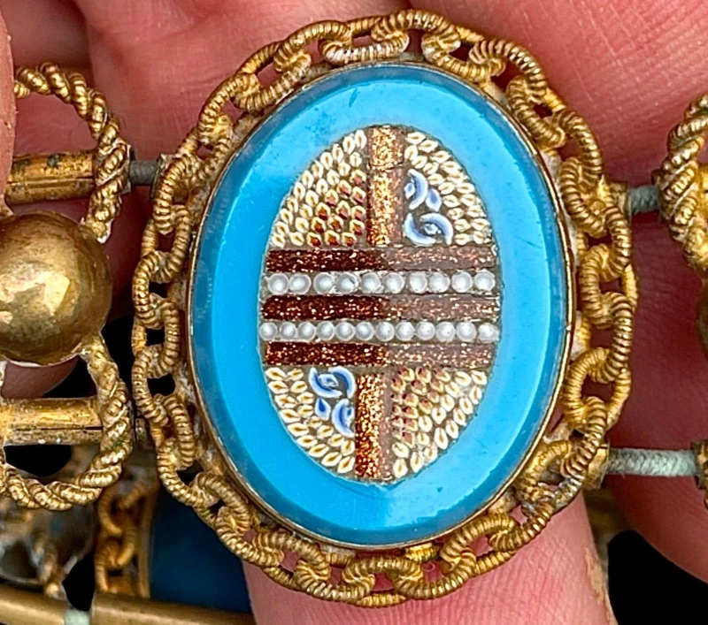 Brass bracelet (with elastic) featuring five oval micro-mosaics with geometric patterns. Rome.