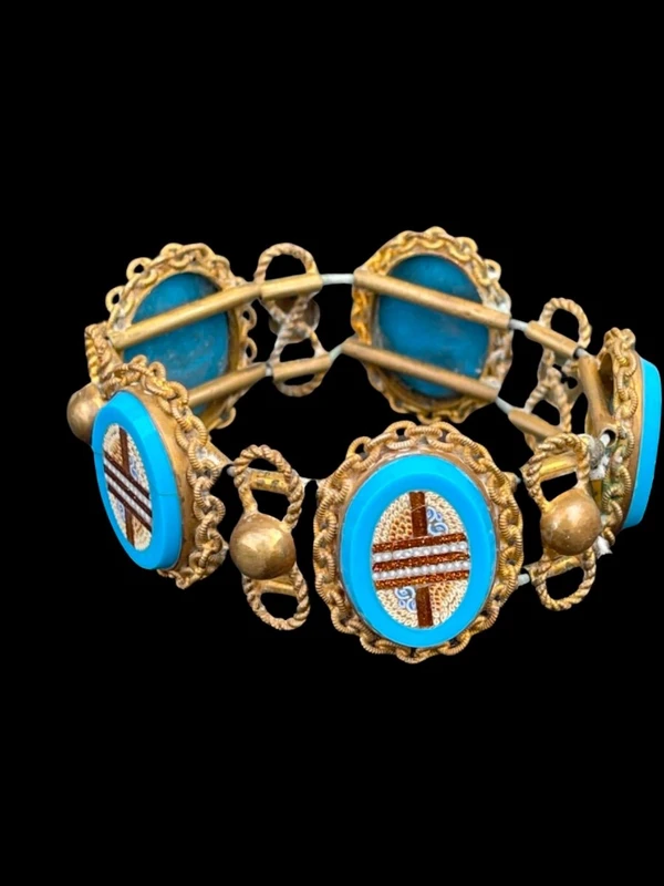 Brass bracelet (with elastic) featuring five oval micro-mosaics with geometric patterns. Rome.