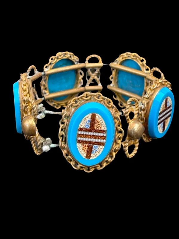 Brass bracelet (with elastic) featuring five oval micro-mosaics with geometric patterns. Rome.