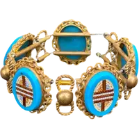 Brass bracelet (with elastic) featuring five oval micro-mosaics with geometric patterns. Rome.