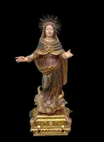 Polychrome wooden sculpture with gold highlights; Madonna wearing a silver crown. Liguria.