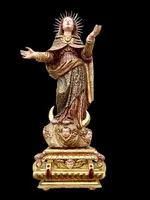 Polychrome wooden sculpture with gold highlights; Madonna wearing a silver crown. Liguria.
