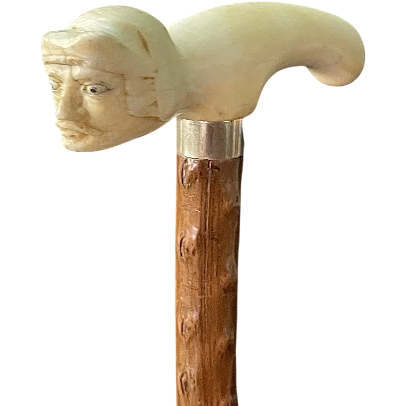 Bastone in avorio con impugnatura tau con testa di guerriero con elmo.canna in legno di rosa.